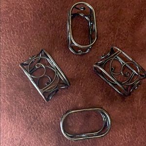 Set of four metal napkin holders